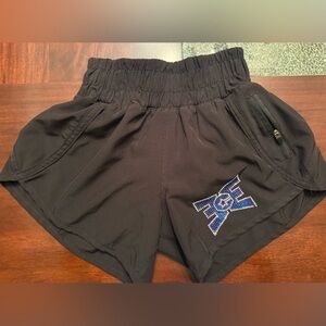 Black varsity brand shorts with ECE logo in blue and white rhinestones